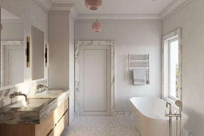 A Boston brownstone renovation features a primary bathroom with an oak vanity, freestanding tub, and marble stone trim, designed by top Boston interior designers.