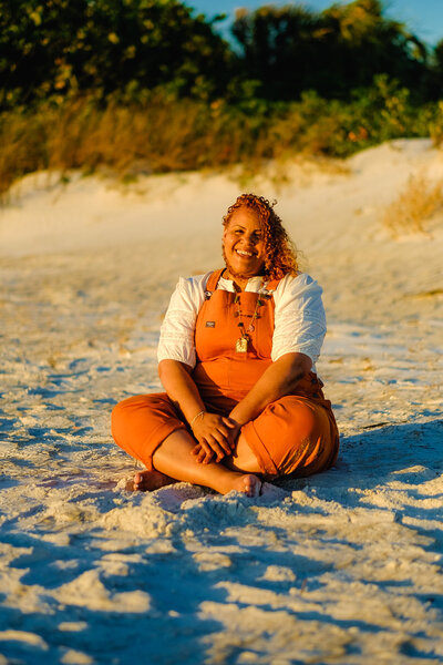 Certified life coach Claudine Martinell, basking in the sun, embodying empowerment and transformation.