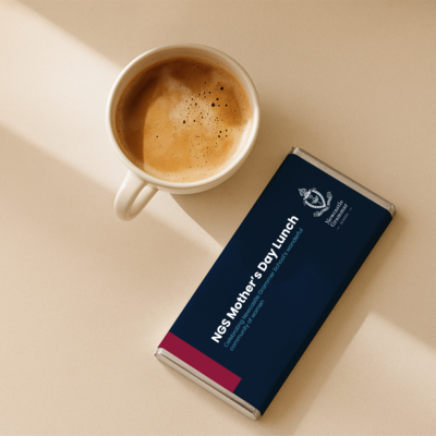 Luxury personalised chocolate bar featuring Newcastle Grammar School design, created by Barilliant for premium school events and gifting.

