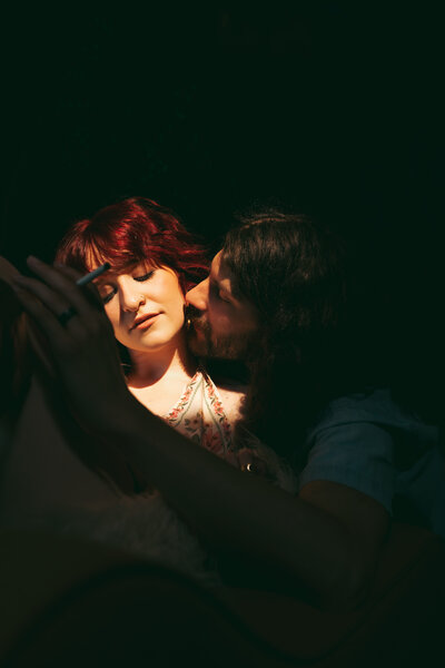 Editorial couples portrait with rich shadow and intimacy in Nashville, TN—emotive, artistic storytelling featured in The Feature session.