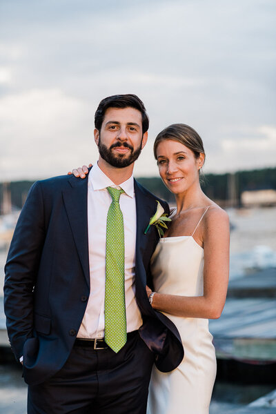 bride and groom on dock