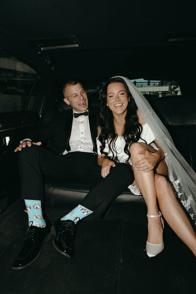 Bride Amy sitting in limo, wedding makeup by MaKall