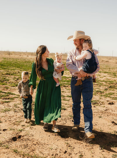 Alex Ingram, a realtor with Capital Realty Group and her family.