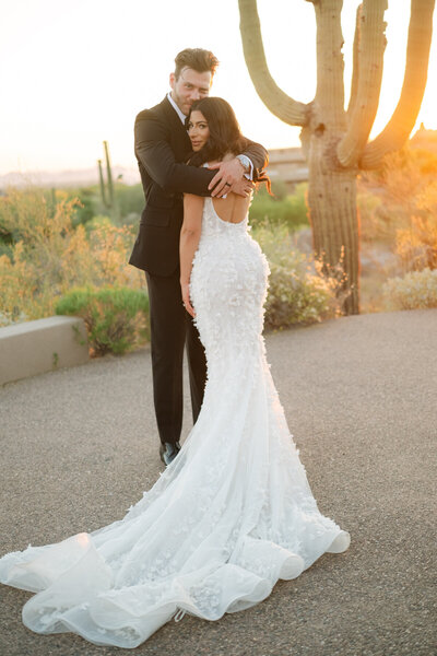 Bride and groom editorial portrait at sunset in Arizona 