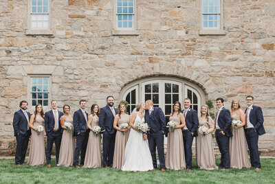 Wedding Photographer & Elopement Photographer, bridal party standing in front of estate