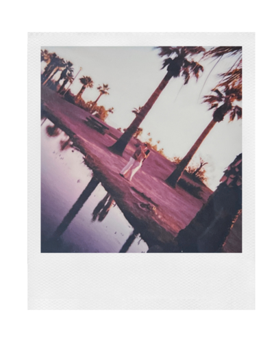 polaroid photo of a couple hugging in the distance at papago park in tempe arizona couples session