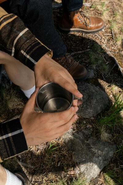 People Camping And Drinking Water Project Basecamp