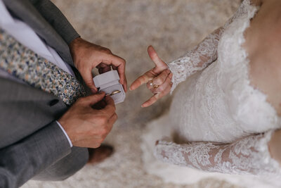 bride and groom rings detail intimate ceremony at borgo santo pietro 
