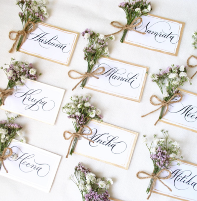 calligraphy name tags with floral addornments