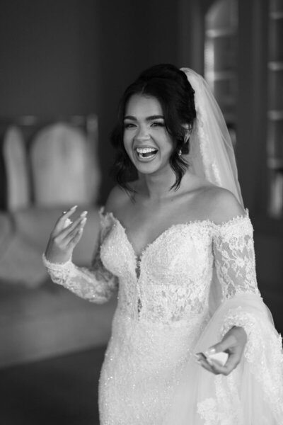 bride laughing on wedding day in Naples FL