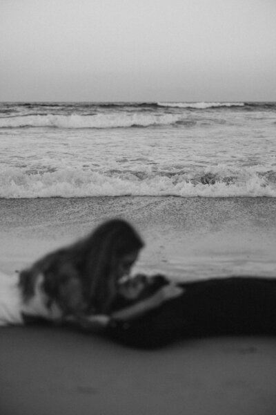 Branding photo of a woman in a red dress against a white wall with a Gucci bag taken by Sunshine Coast photographer