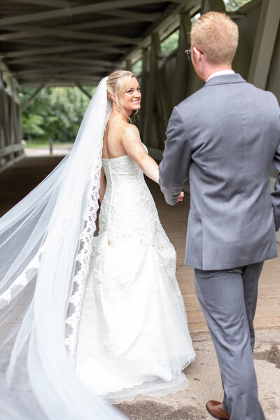 Showing off long veil