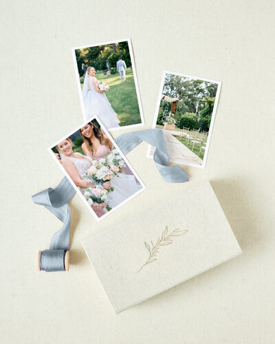 Box of printed wedding photos