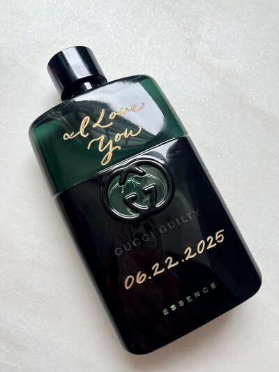 Hand engraved bottle of cologne for groom on wedding day.