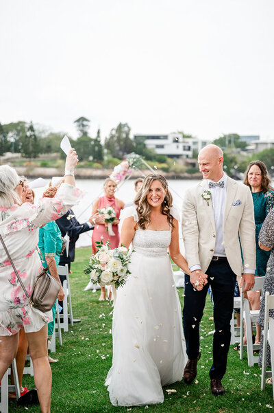 Bride and Groom walking hand in hand
