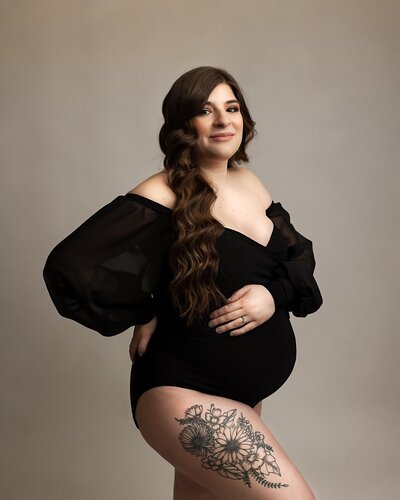 Portland pregnant mom in black romper in studio maternity session