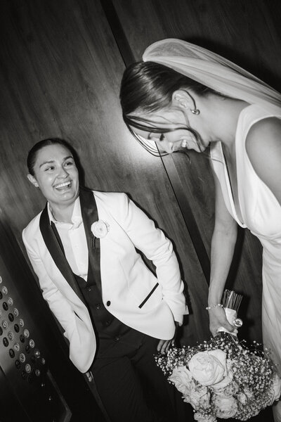 Portrait of the bride by herself preparing to walk down the aisle to marry her best friend.