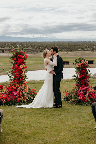Bold and colorful wedding florals for Kit and Mark featuring rich tones and modern design by Summer Robbins Flowers in Central Oregon