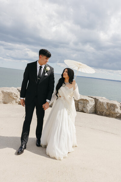 Editorial romantic wedding photo of multicultural couple at The Pearle Hotel in Burlington Ontario by Cacie Carroll Photography, luxury editorial wedding photographer