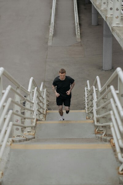Man running up stairs
