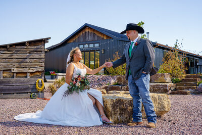 Vibrant Wedding Photographer in Colorado Springs, Bridal Portrait with stunning cape at Baldoria on the Water.