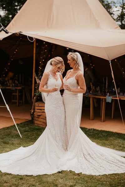 Brides laughing infront of Tipi-1