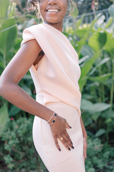 Atlanta Wedding Photographer | Woman Wearing Pale Pink Dress And Jewelry At Virginia House