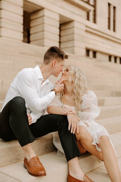 couple captured on city steps by a nashville wedding photographer