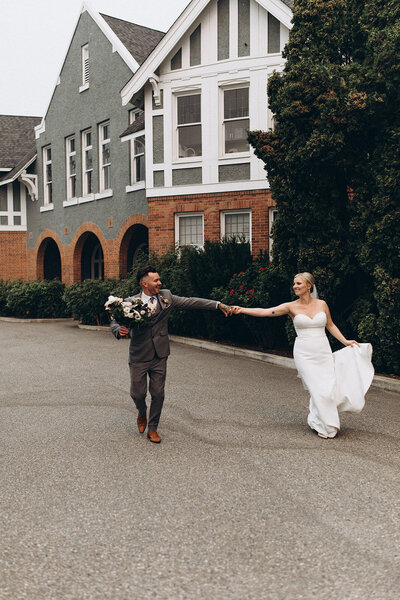 Editorial wedding inspiration, couple walking, holding hands, captured by Bryttanni, luxury and artistic wedding photographer in Edmonton, Alberta. Featured on the Bronte Bride Vendor Guide.