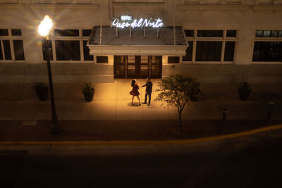 Couple dancing under street lights at night during a Utah session, captured by Lamblight Photography