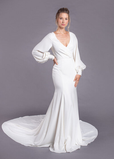 Link to more details and photos of the Milly full bishop sleeve wedding dress style in crepe.