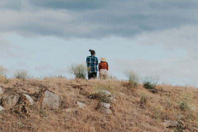 Couple looks out at Emigrant Lake in Ashland, Oregon.