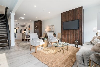 Staged living room in vacant home designed for buyer engagement and faster sales