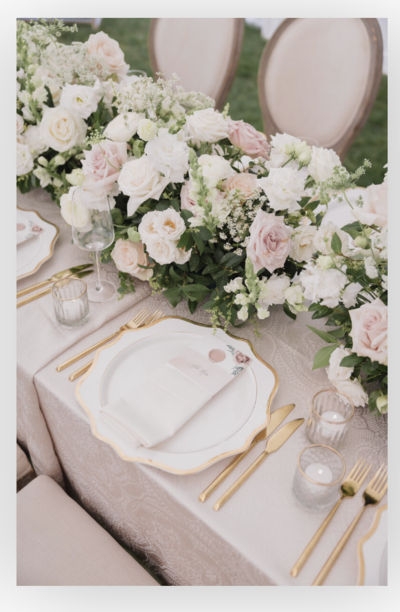 A pink and gold table setting for a Hamptons wedding