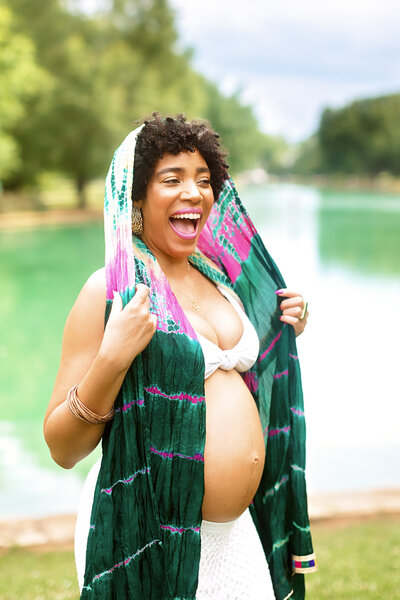 Photo of excited expectant mother in beautiful Freedom Park, Charlotte NC