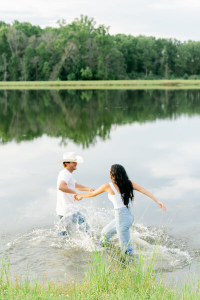 A couple going for a swim during their georgia engagemet session