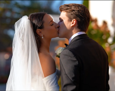 up close photo of bride and groom kissing