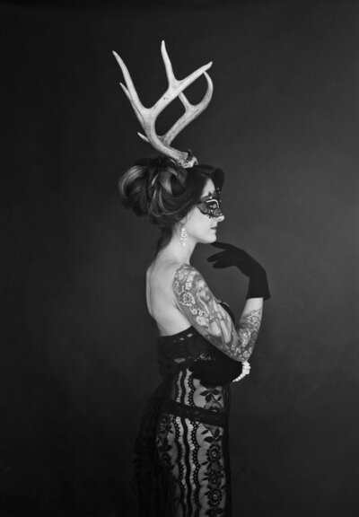 Artistic photo of a woman with deer antlers, by Carrie Roseman Studios, Connecticut