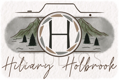 Graphic Logo with Camera and Mountain Design representing Hiliary Holbrook Studios