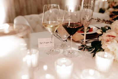 Wedding table decoration with wine glasses.