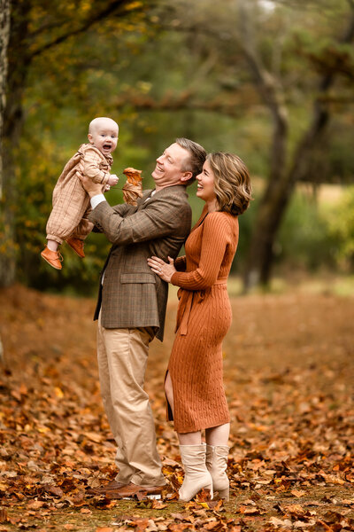 Family laughs together during a  family photoshoot near Birmingham