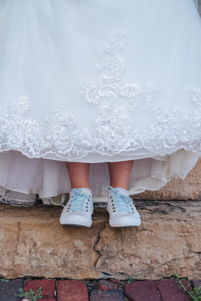 bride shows wedding converse in arizona