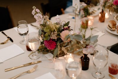 flowers on a table for a wedding reception