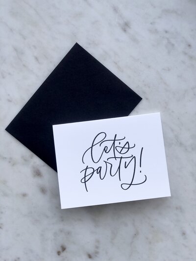 Card that reads "let's party!"