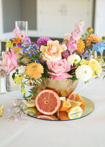Floral-centerpiece-citrus accents- for-modern-elegant-events.