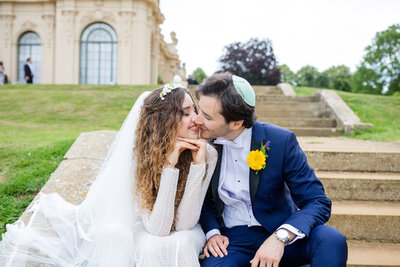 Bride and Groom kissing at Coworth Park