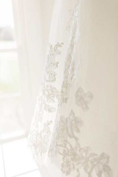 closeup of lace wedding dress