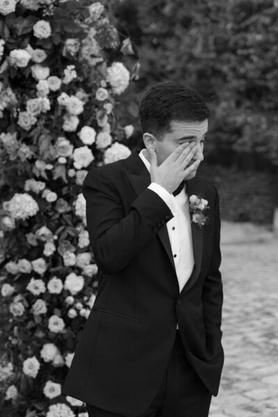 a groom moved by seeing his wife
