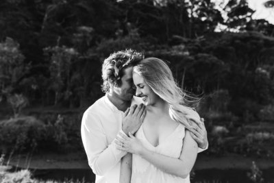 Black and white image of couple at engagement shoot