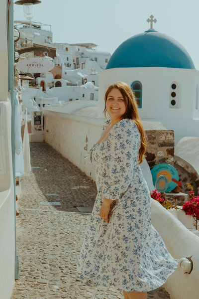girl in blue and white dress in Greece